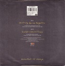 7" back, DE